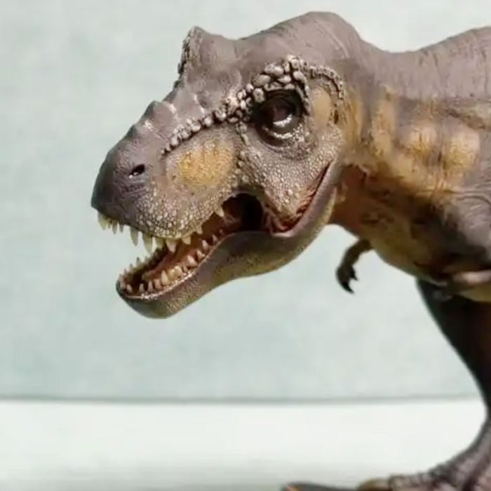 velociraptor dinosaur statue​